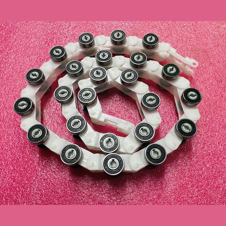 Цепь огибающая балюстрады 25 пар шаг 45 R20 KM5232300G02 TravelMaster Kone